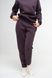 Штани-джоггери жіночі теплі темно-фіолетового кольору 230412 фото 3