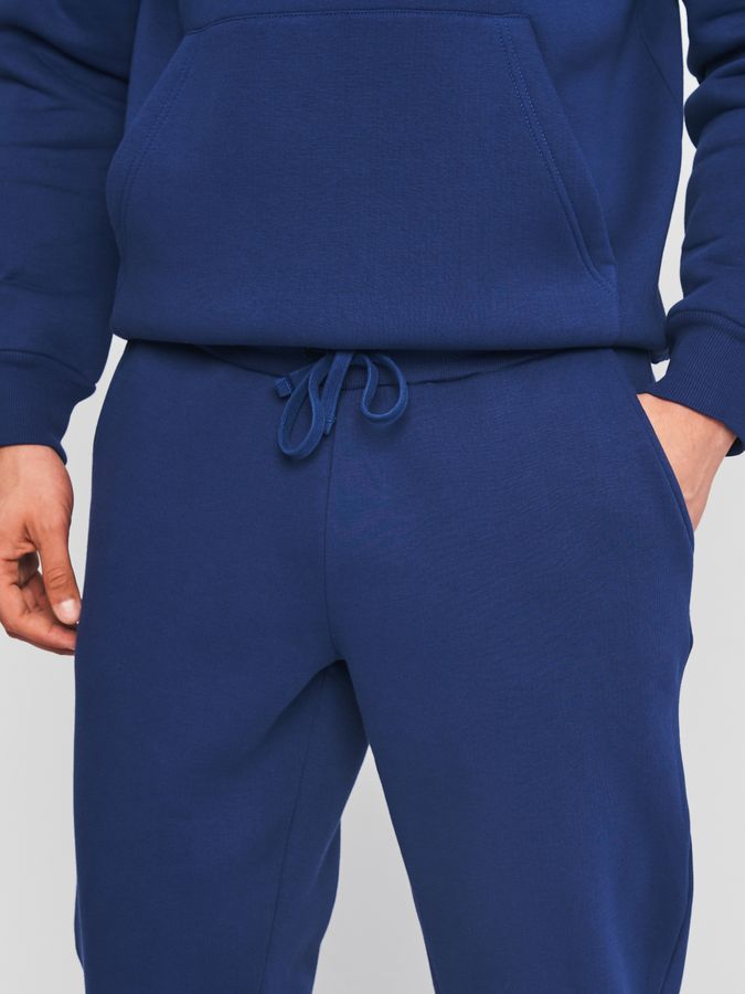 Штани чоловічі утеплені з манжетами синього кольору 210549 фото